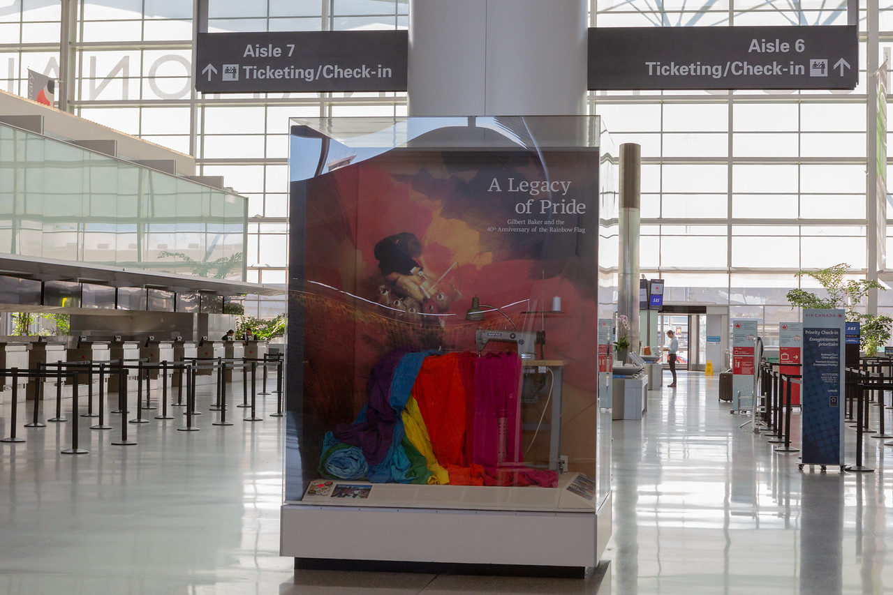 Display by the San Francisco Airport Museum honoring the late Gilbert Baker,  (co – creator of the Rainbow Flag)